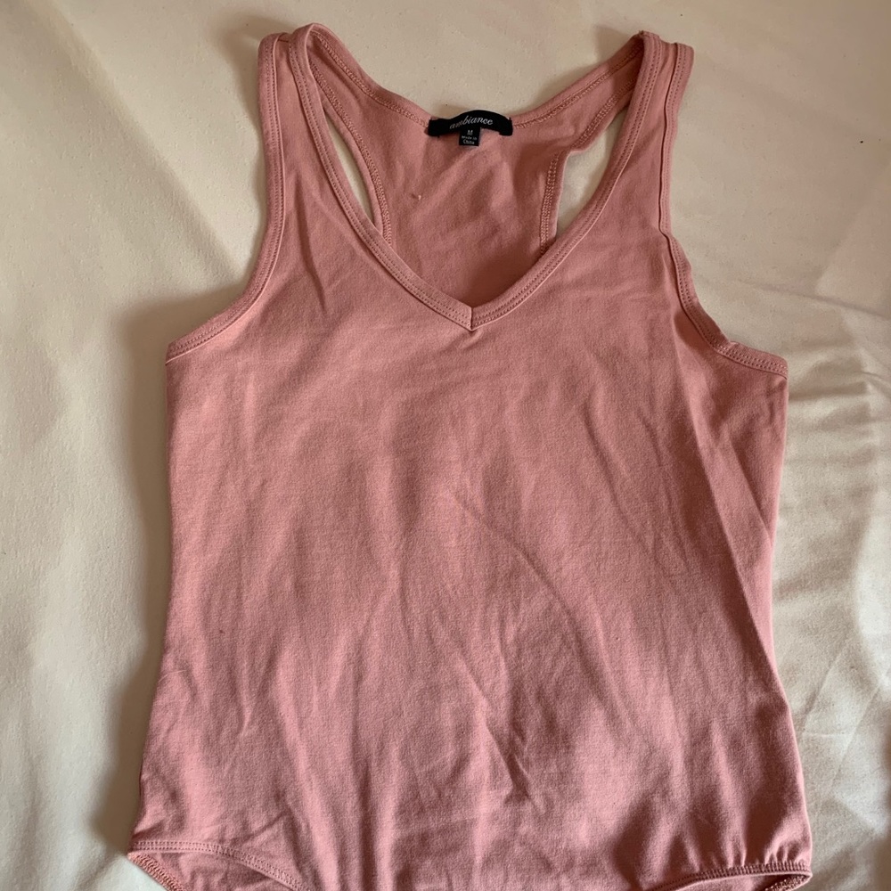 Fashion Nova Blush colored body suit